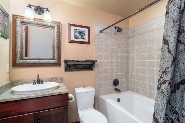 full bathroom featuring vanity, shower / bath combo, and toilet
