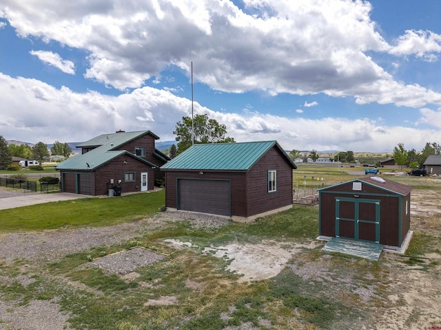 16303 6760th Rd, Montrose, CO 81401 - detached garage featuring a shed