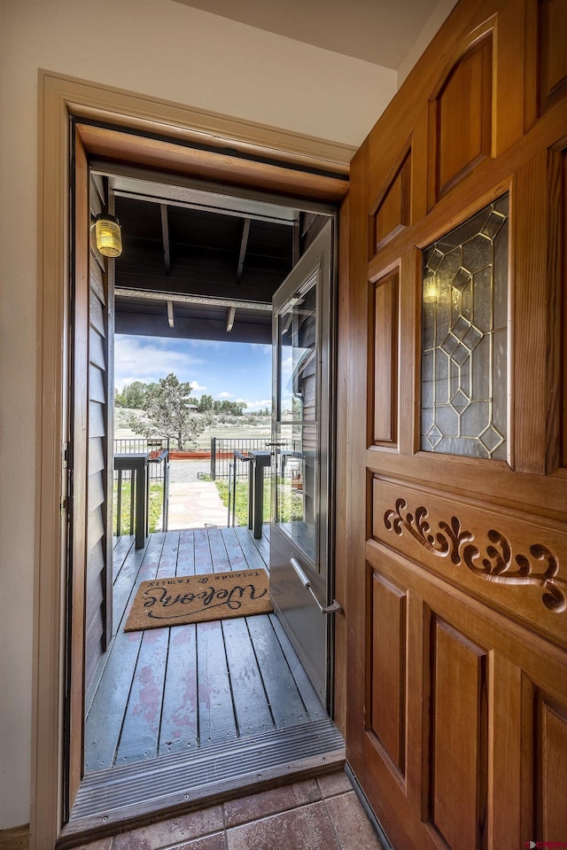 16303 6760th Rd, Montrose, CO 81401 - doorway to outside with stone finish flooring