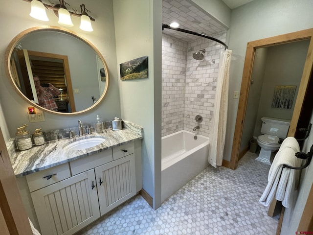 209 Deer Path Ln, Almont, CO 81230 - full bathroom featuring toilet, vanity, baseboards, and shower / tub combo