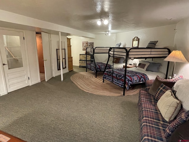 209 Deer Path Ln, Almont, CO 81230 - bedroom featuring dark carpet and ceiling fan