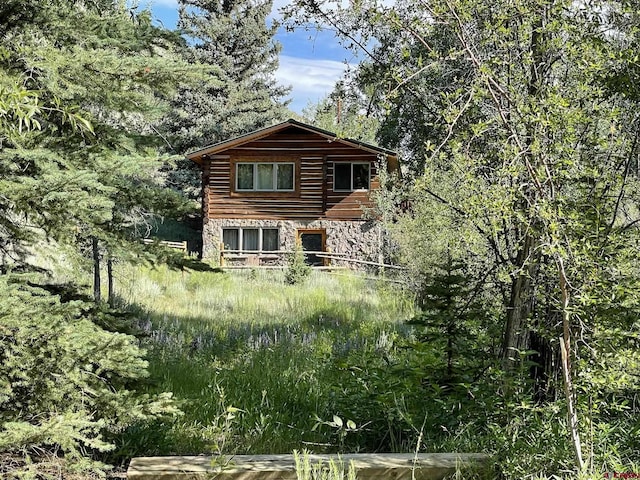209 Deer Path Ln, Almont, CO 81230 - back of house with stone siding