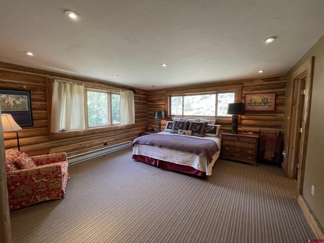209 Deer Path Ln, Almont, CO 81230 - carpeted bedroom with log walls, multiple windows, and recessed lighting
