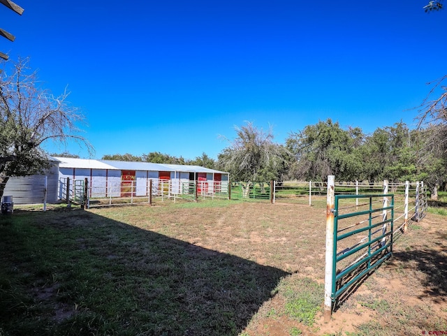 14120 Rd 26, Dolores, CO 81323 - view of yard featuring an exterior structure and an outbuilding