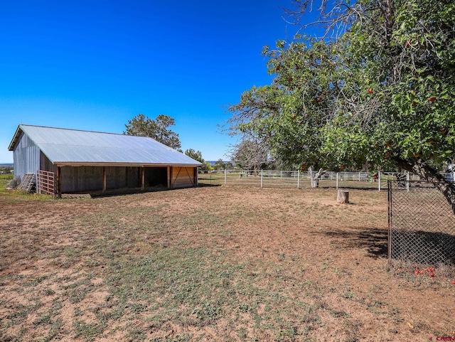 14120 Rd 26, Dolores, CO 81323 - view of yard featuring an outbuilding and fence