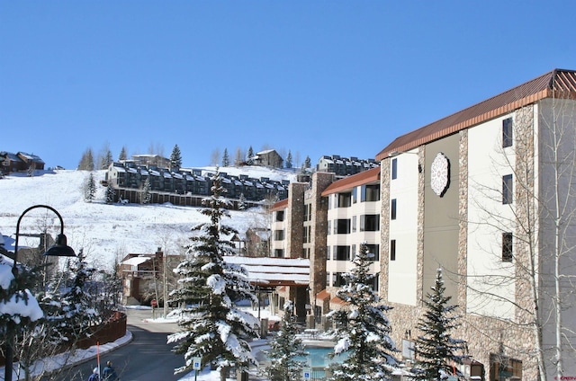 view of snow covered property