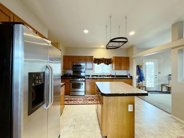 360 Forest Hill Rd, Ridgway, CO 81432 - kitchen featuring stainless steel appliances, healthy amount of natural light, a sink, a center island, and recessed lighting