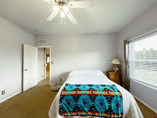 360 Forest Hill Rd, Ridgway, CO 81432 - bedroom featuring carpet floors, baseboards, and ceiling fan