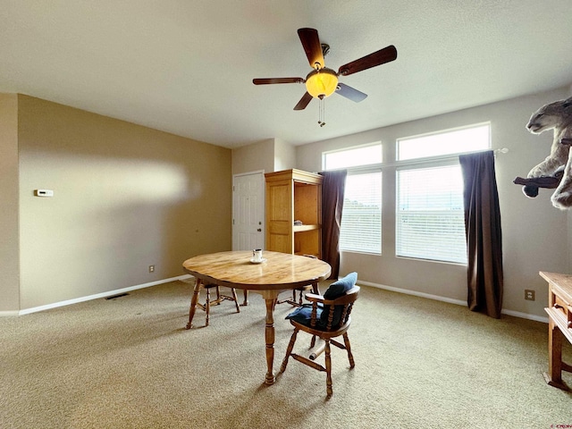 360 Forest Hill Rd, Ridgway, CO 81432 - dining area featuring ceiling fan, baseboards, and light colored carpet