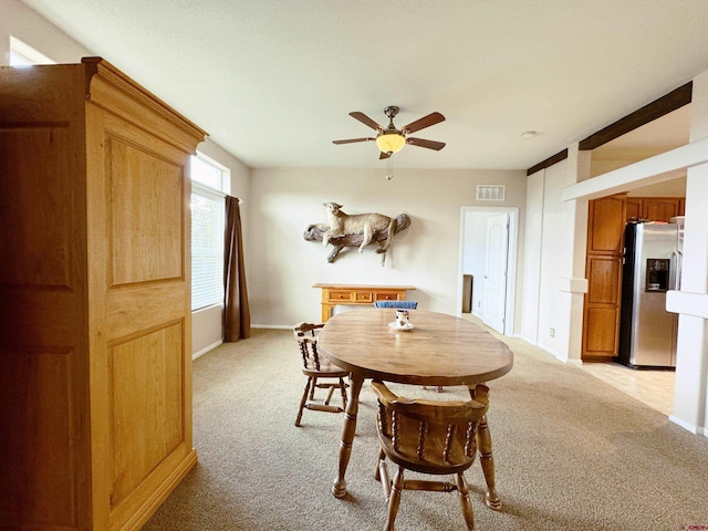 360 Forest Hill Rd, Ridgway, CO 81432 - dining room with light carpet, ceiling fan, and baseboards