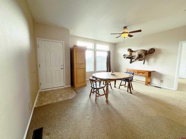 360 Forest Hill Rd, Ridgway, CO 81432 - carpeted dining room featuring a ceiling fan and baseboards