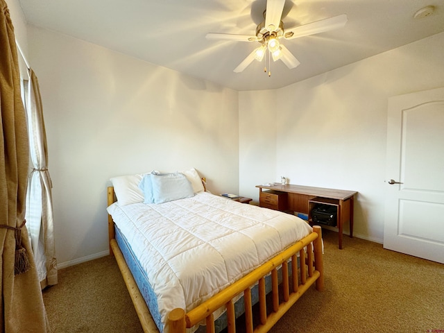 360 Forest Hill Rd, Ridgway, CO 81432 - bedroom with carpet flooring, baseboards, and a ceiling fan