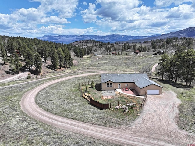 360 Forest Hill Rd, Ridgway, CO 81432 - aerial view of property and surrounding area featuring a mountainous background