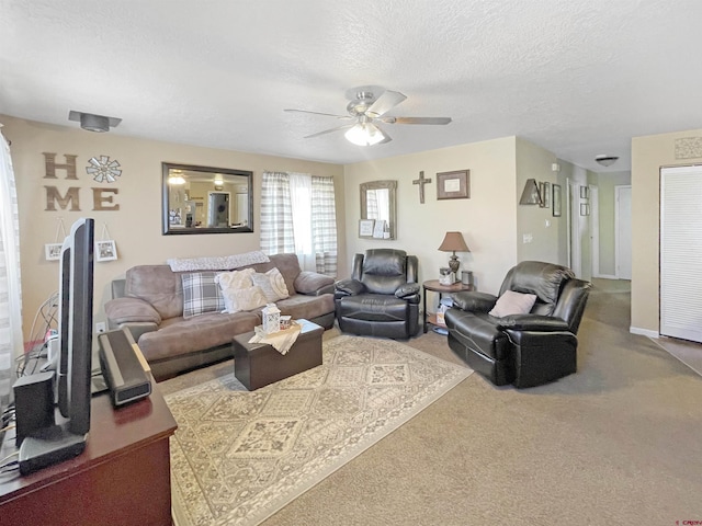 1510 W Sixth St, Alamosa, CO 81101 - living room featuring carpet, ceiling fan, and a textured ceiling