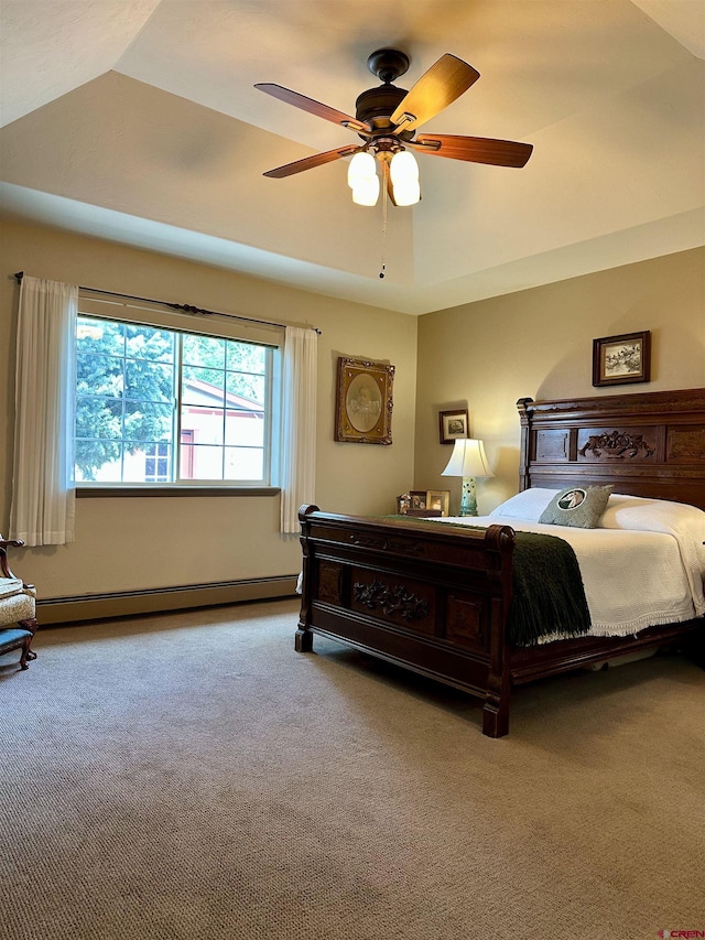 bedroom with a baseboard radiator, carpet flooring, and a ceiling fan