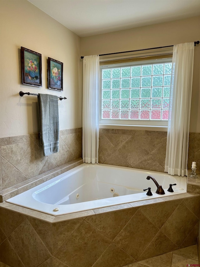 full bath with a jetted tub