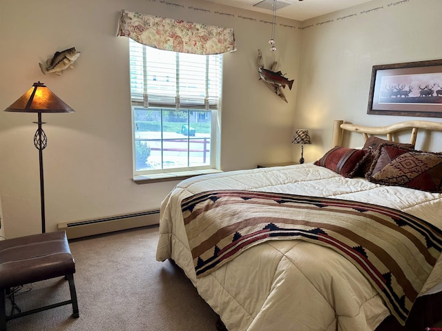 carpeted bedroom with a baseboard heating unit