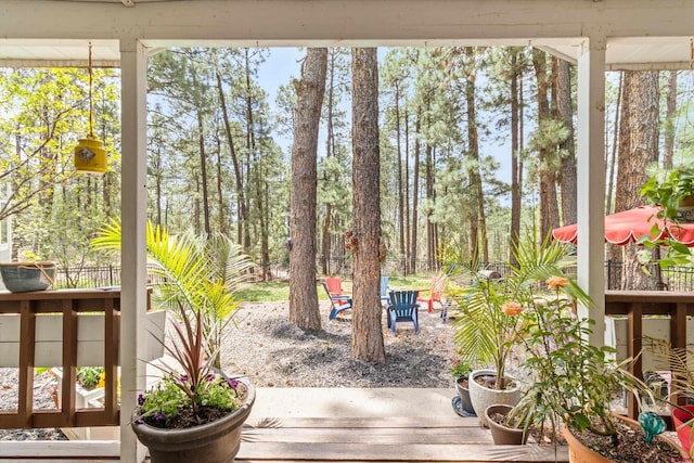 deck featuring fence and a patio area