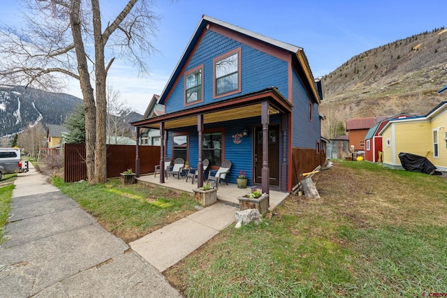 1257 Snowden St, Silverton, CO 81433 - view of front facade featuring covered porch and a mountain view