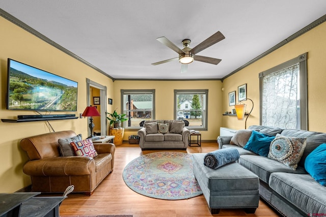 1257 Snowden St, Silverton, CO 81433 - living area with ornamental molding, a ceiling fan, and wood finished floors