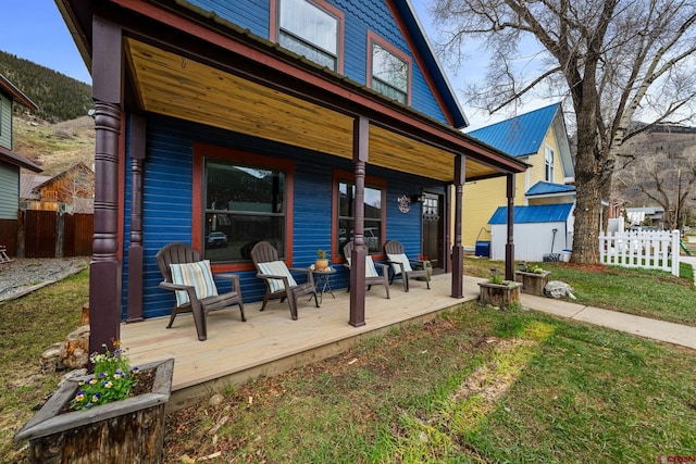 1257 Snowden St, Silverton, CO 81433 - view of patio / terrace featuring a porch and fence