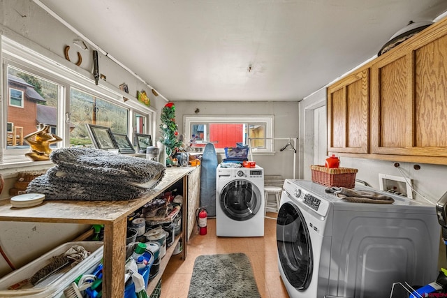 1257 Snowden St, Silverton, CO 81433 - laundry room featuring cabinet space, separate washer and dryer, and light tile patterned floors