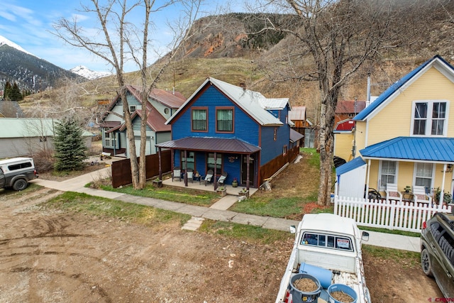 1257 Snowden St, Silverton, CO 81433 - view of front facade with covered porch and a mountain view