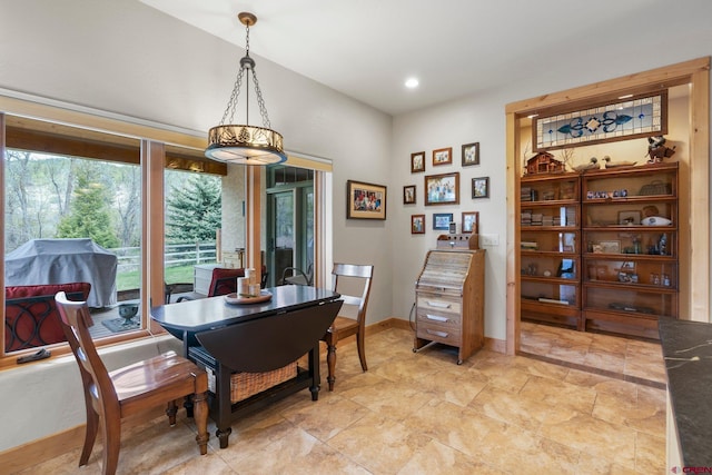 99 River Rd, Durango, CO 81301 - dining room featuring baseboards and recessed lighting