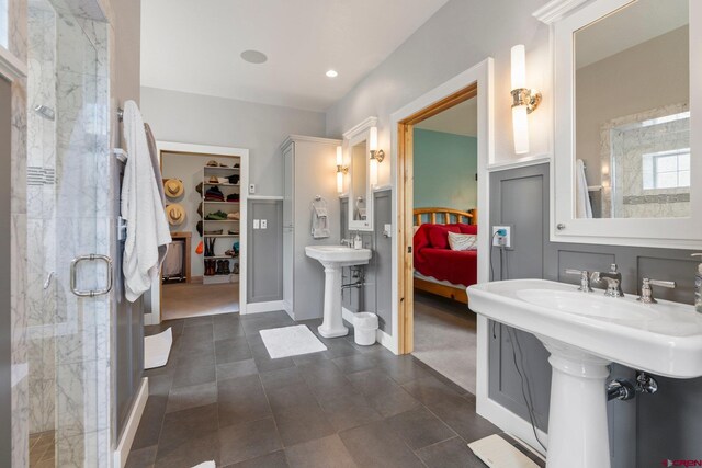 99 River Rd, Durango, CO 81301 - ensuite bathroom featuring a shower stall, a walk in closet, a sink, and recessed lighting