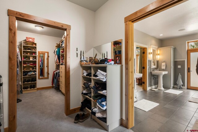 99 River Rd, Durango, CO 81301 - corridor featuring baseboards and a sink