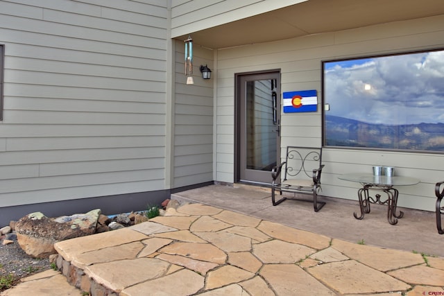 53315 Bull Basin Rd, Mesa, CO 81643 - view of exterior entry featuring a patio area