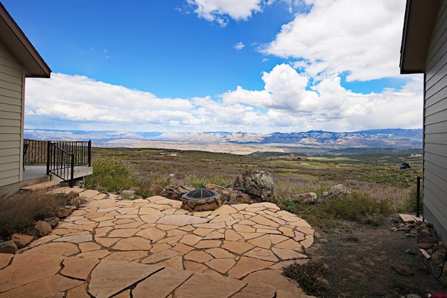 53315 Bull Basin Rd, Mesa, CO 81643 - view of patio / terrace featuring a mountain view and a fire pit