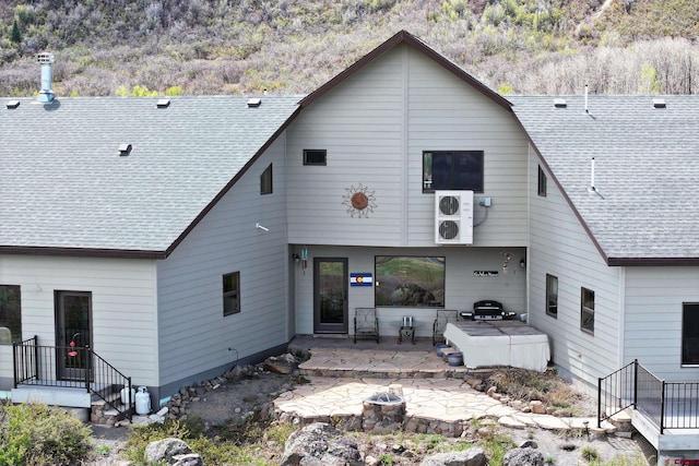 53315 Bull Basin Rd, Mesa, CO 81643 - rear view of property with a patio and a shingled roof