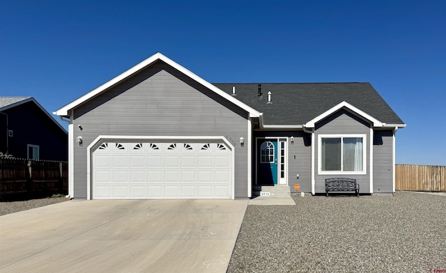 2918 Andersen Cir, Alamosa, CO 81101 - single story home featuring fence, driveway, and an attached garage