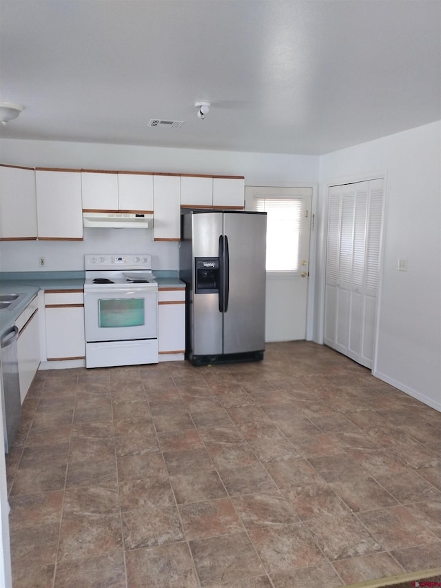 240 S Madison St, Cortez, CO 81321 - kitchen featuring appliances with stainless steel finishes, under cabinet range hood, and white cabinetry