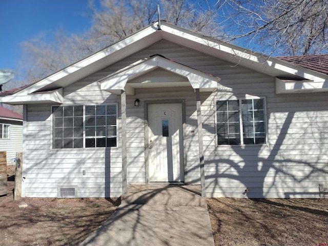 240 S Madison St, Cortez, CO 81321 - doorway to property featuring crawl space