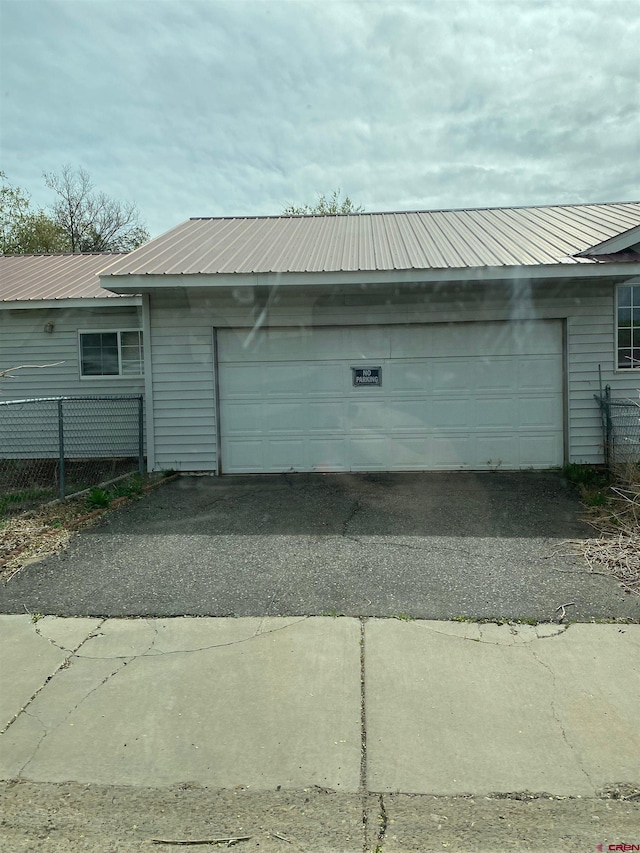 240 S Madison St, Cortez, CO 81321 - garage featuring fence
