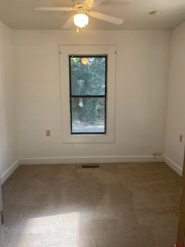 145 S Madison St, Cortez, CO 81321 - unfurnished room with carpet flooring, ceiling fan, and baseboards
