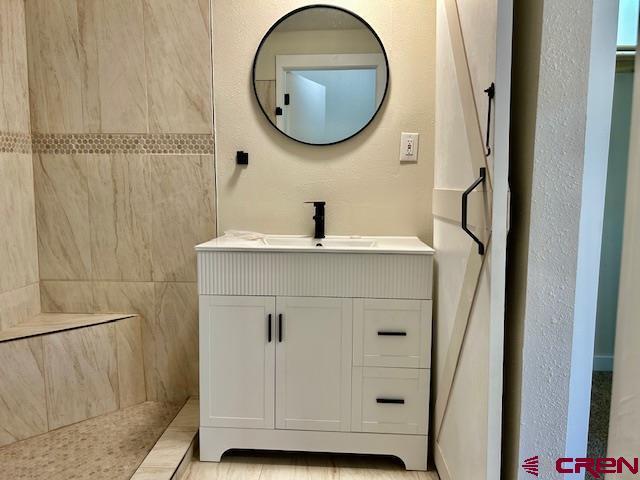1414 Bluff St, Delta, CO 81416 - bathroom featuring vanity