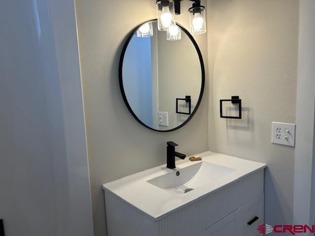 1414 Bluff St, Delta, CO 81416 - bathroom with vanity