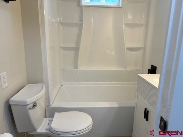 1414 Bluff St, Delta, CO 81416 - bathroom with toilet, vanity, and shower / bath combination