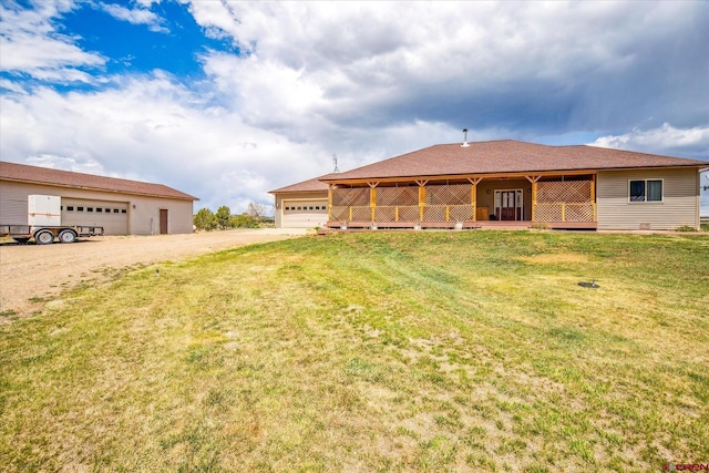 28725 Road P.8, Dolores, CO 81323 - ranch-style house featuring a front lawn and a detached garage