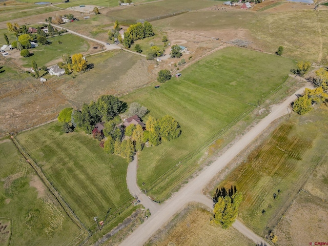 aerial view of property and surrounding area with rural landscape