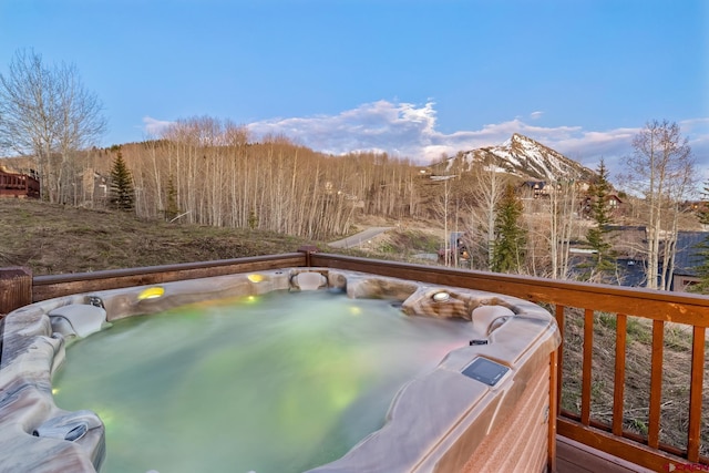 32 Cinnamon Mountain Rd, Mount Crested Butte, CO 81225 - wooden terrace with a hot tub