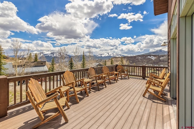 32 Cinnamon Mountain Rd, Mount Crested Butte, CO 81225 - wooden deck with a mountain view