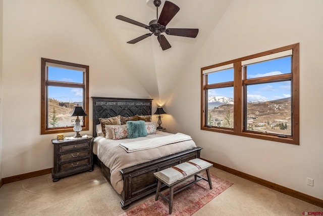 32 Cinnamon Mountain Rd, Mount Crested Butte, CO 81225 - bedroom featuring light colored carpet, vaulted ceiling, baseboards, and multiple windows