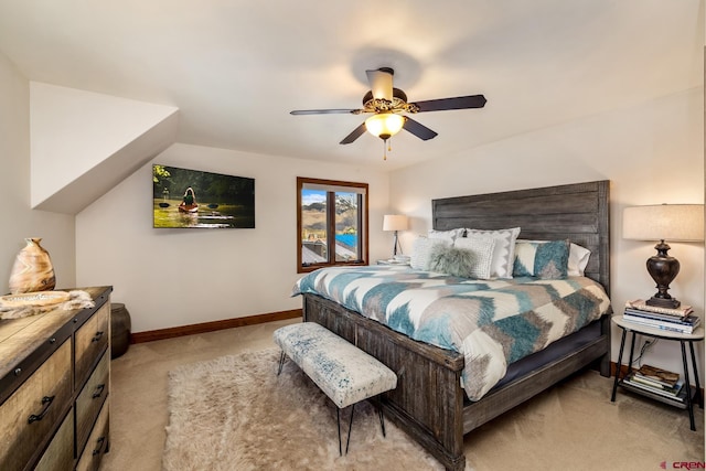 32 Cinnamon Mountain Rd, Mount Crested Butte, CO 81225 - bedroom with light colored carpet, baseboards, and a ceiling fan