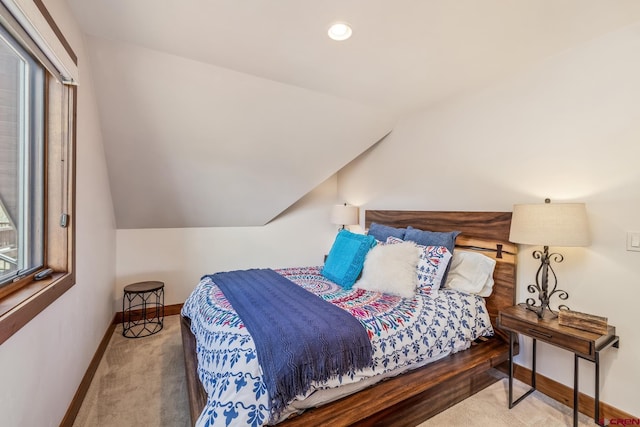 32 Cinnamon Mountain Rd, Mount Crested Butte, CO 81225 - bedroom with baseboards, vaulted ceiling, carpet, multiple windows, and recessed lighting