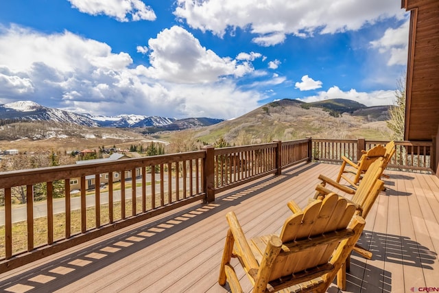 32 Cinnamon Mountain Rd, Mount Crested Butte, CO 81225 - wooden deck featuring a mountain view