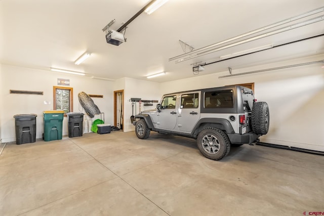32 Cinnamon Mountain Rd, Mount Crested Butte, CO 81225 - garage featuring a garage door opener